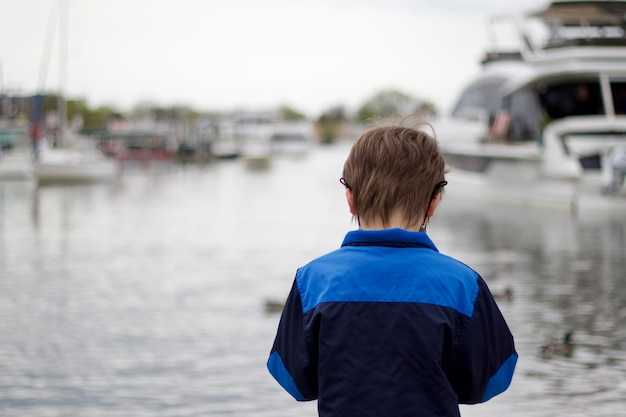 Approach moored, anchored, or fishing vessels with clear passage and caution